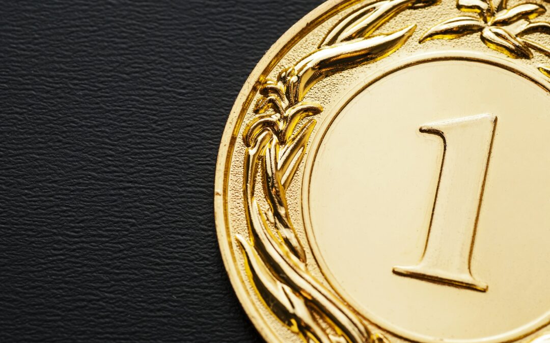 close up of a golden medal for the number one