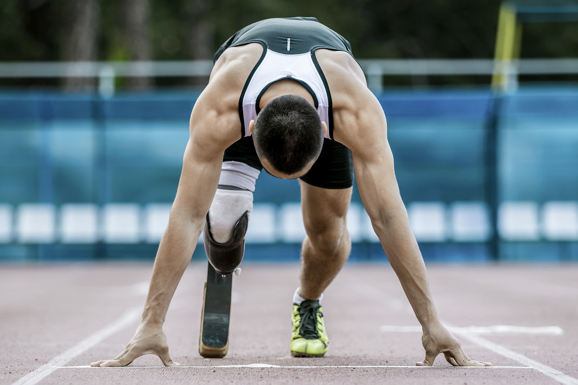 disabled athlete preparing to start running